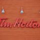 tim hortons logo on a wooden wall