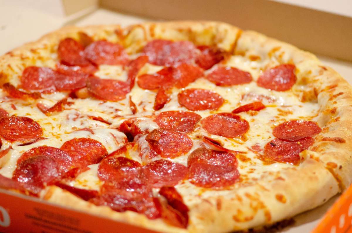 zoomed in pizza in a box