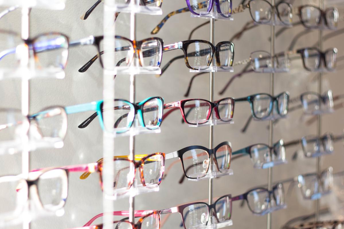 different colored eyeglasses on display