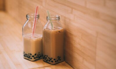 two bottles of bubble tea with straws