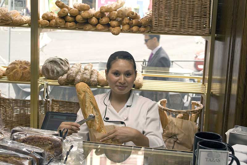 baker holding bread