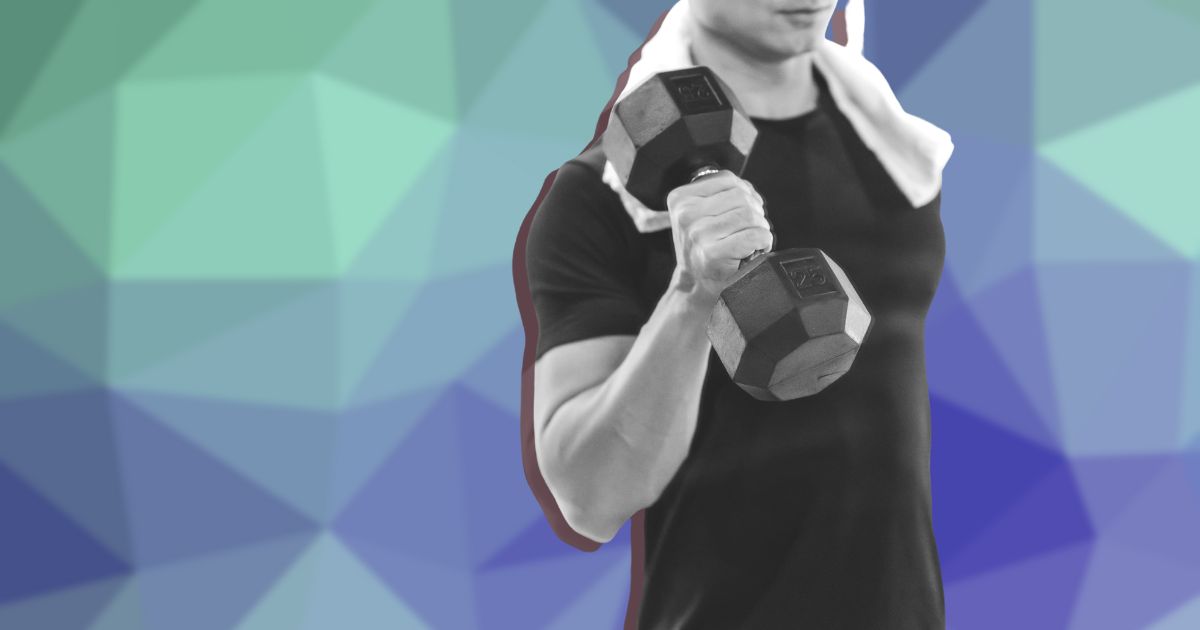 man holding a dumbbell
