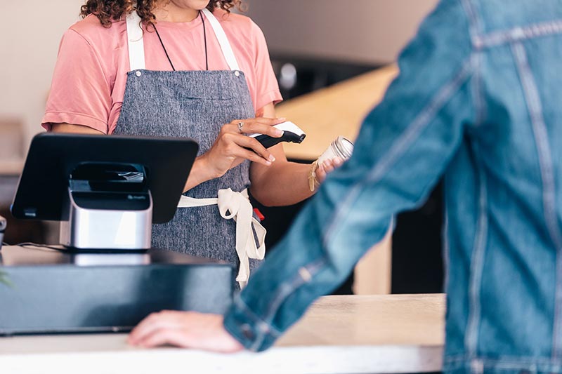 two people near a cash register