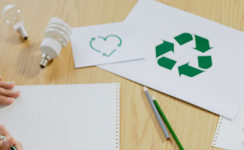 reduce reuse recycle symbol on paper