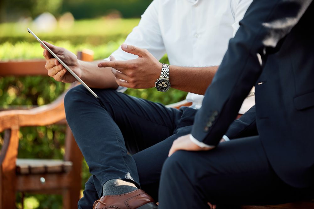 cropped man holding a tablet