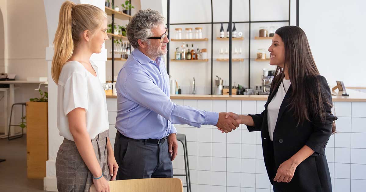 two people shaking hands